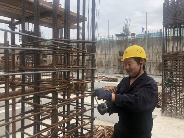 按下快門，定格建設(shè)施工一線最美身影